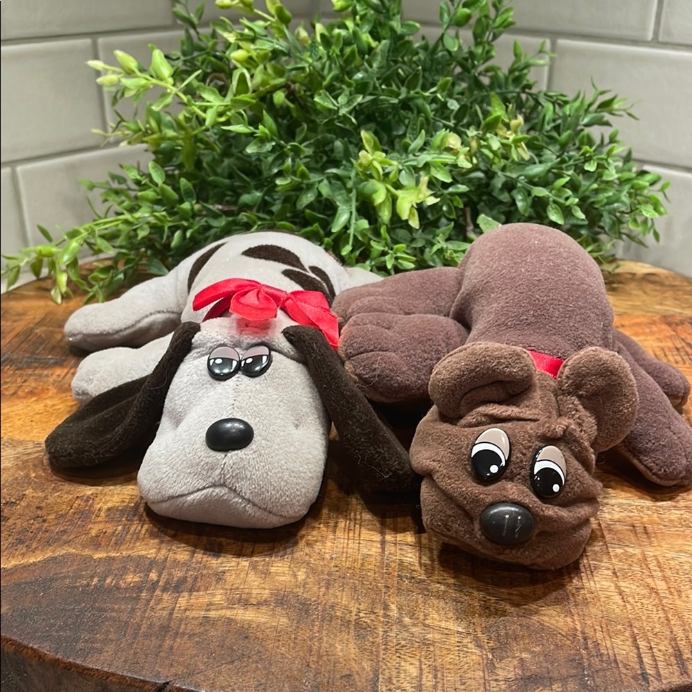 A Pair Of Vintage Pound Puppies 1985 Tonka Corp. One Brown, One Grey & Brown